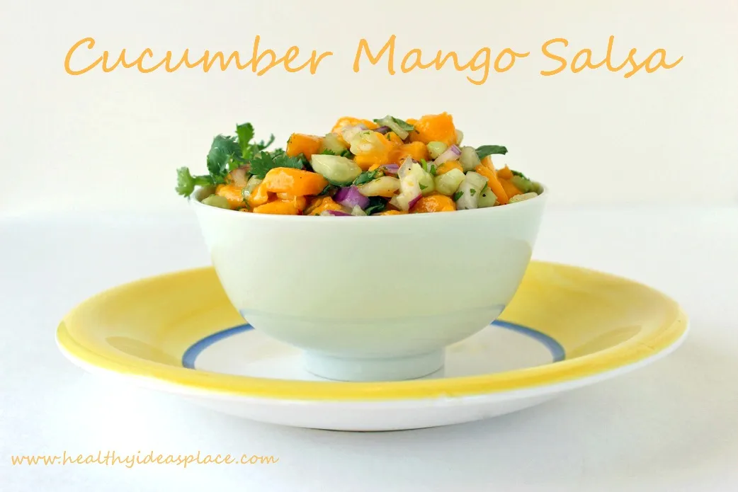 Cucumber Mango Salsa in a white bowl from a side angle