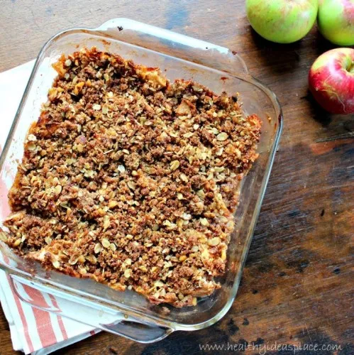 Maple Walnut Apple Crisp in a clear square baking dish