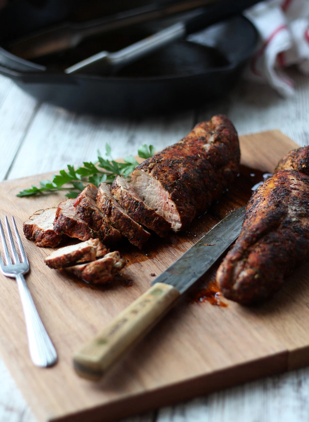 2 pork roasts on wood cutting board