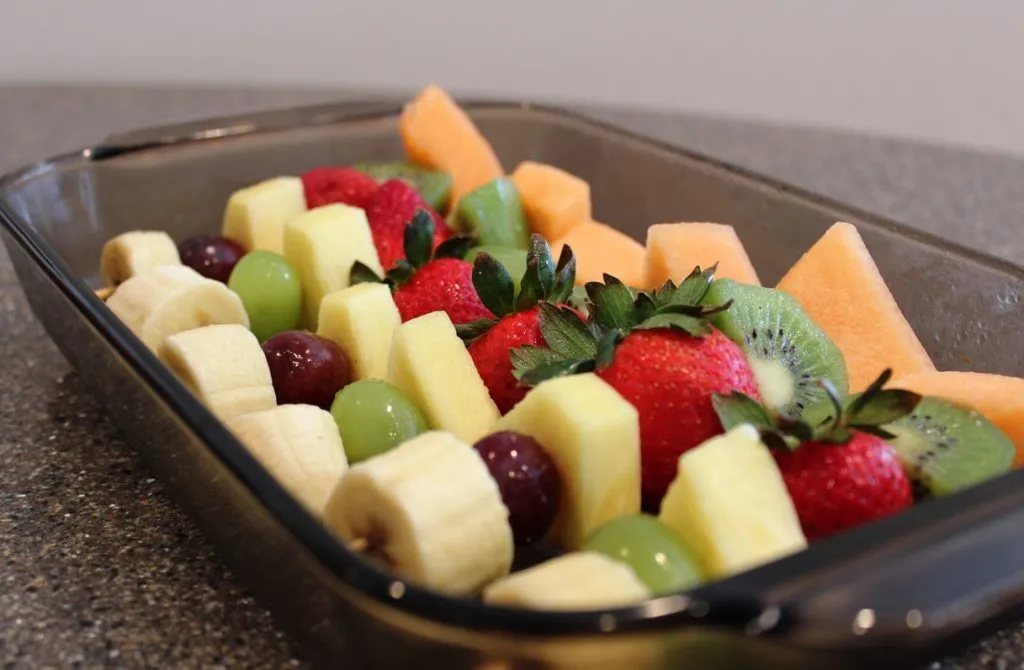 Fruit Kebabs with Honey-Lime-Ginger Vinaigrette in pan