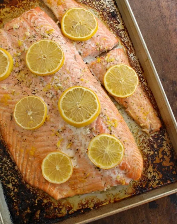 Seasoned with lemon, garlic, and dill, Baked Salmon with Lemon-Dill Sauce is nourishing, heart healthy, delicious, and quick and easy to prepare.