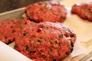 Grilled burgers raw