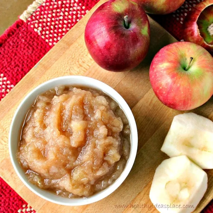 Closeup of chunky applesauce and apples