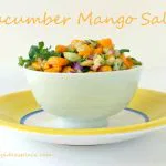 Cucumber Mango Salsa in a white bowl from a side angle