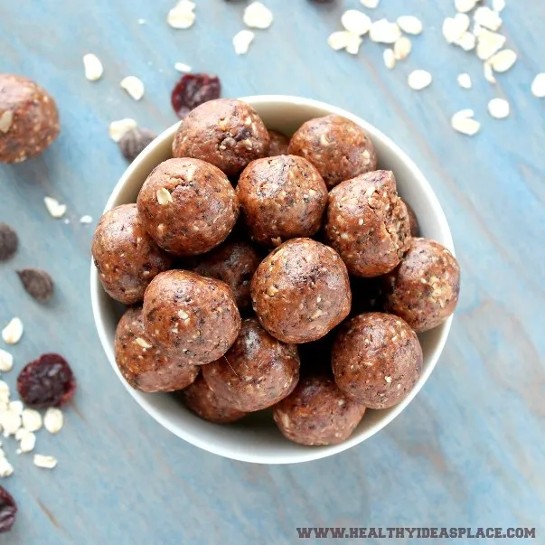 A white bowl filled with Peanut Butter Energy Bites photographed from above