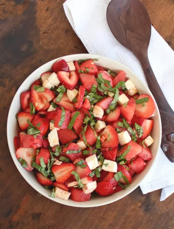 Strawberry Watermelon Caprese Salad is a nourishing, flavorful, summertime salad with fresh from the garden strawberries, watermelon, and basil.