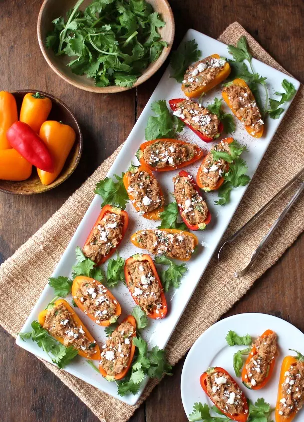 Southwest Tuna Stuffed Mini Peppers - a healthy appetizer that's quick and easy to make, but filled with flavor and touch of heat!