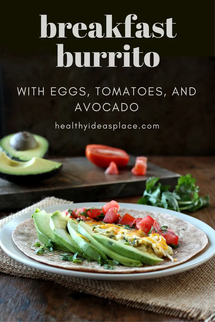 Breakfast Burrito with Eggs, Tomato, and Avocado makes a healthy and satisfying breakfast filled with high quality protein, healthy fats, and tasty veggies.