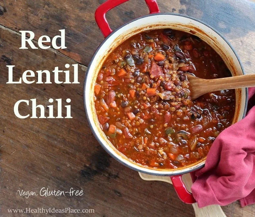 Vegetarian Chili with Red Lentils - Cold days call for a bowl of warm, spicy chili. This healthier vegetarian chili calls for red lentils and lots of veggies instead of meat - perfect for meatless Mondays or any day of the week!