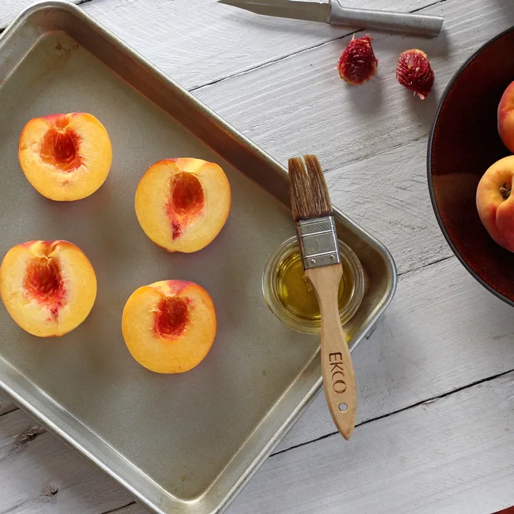 Grilled Peaches with Honey and Lemon Yogurt Sauce - Use up your not-so-great peaches (no flavor or mealy) by grilling them instead! Grilled peaches topped with a honey and lemon yogurt sauce are quick and easy to make, and delicious too!