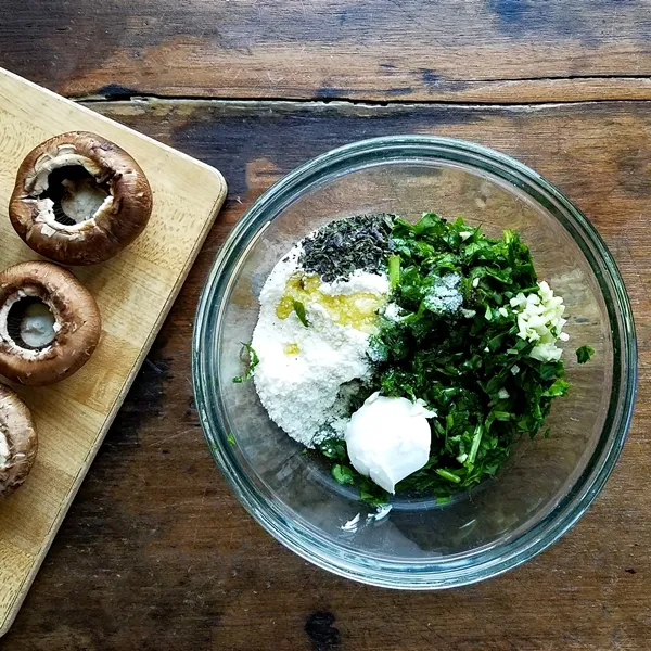 Stuffed Mushrooms with Spinach and Parmesan - Easy to make, and healthier stuffed mushrooms. This recipe is the perfect appetizer when you want something elegant and delicious.