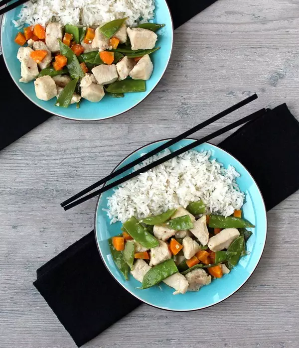 Chicken and Snow Peas in blue bowl with rice