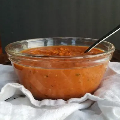 roasted cherry tomato sauce in clear glass bowl