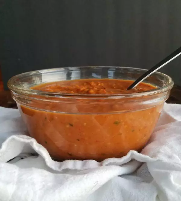 roasted cherry tomato sauce in clear glass bowl