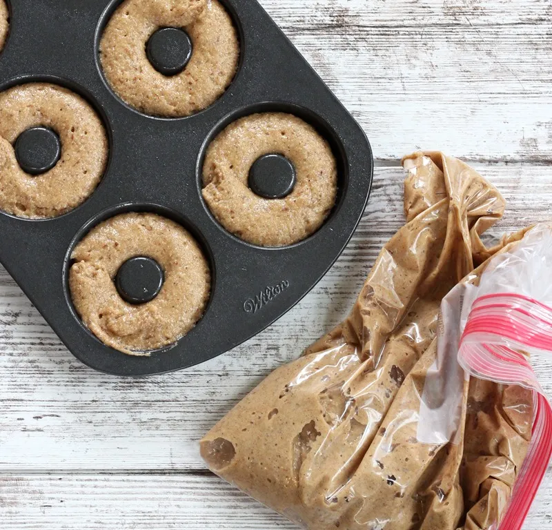 apple cider donuts unbaked in pan