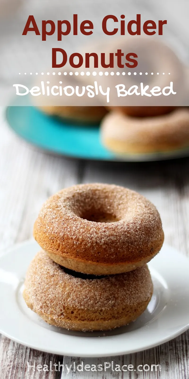 apple cider donuts stacked on white plate