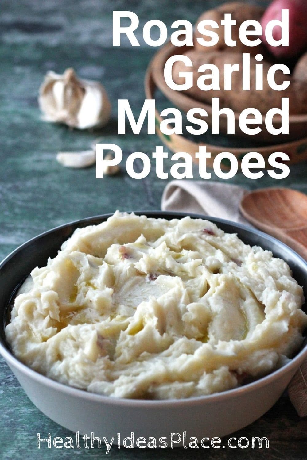 Mashed potatoes in bowl against green background