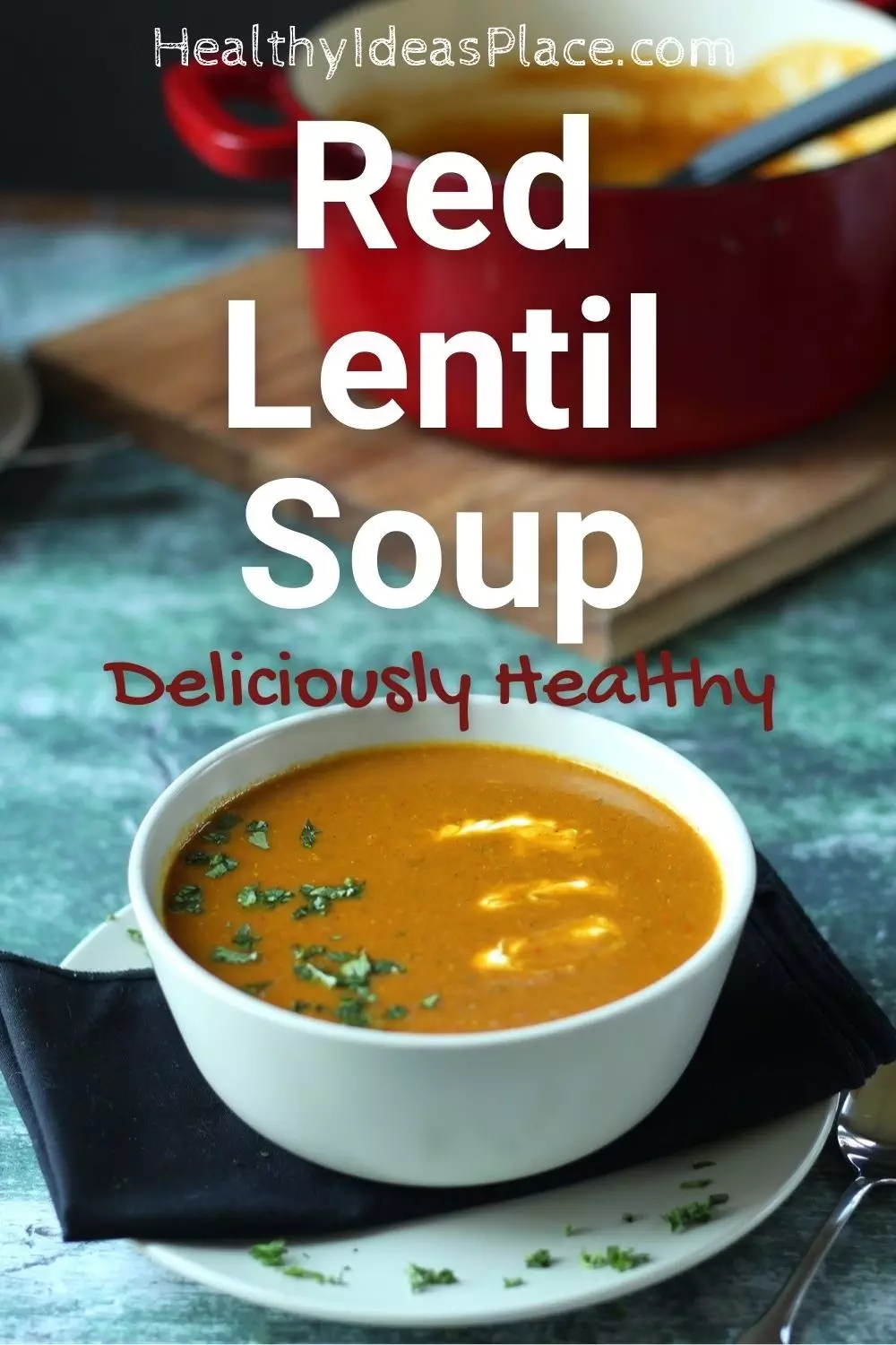 Red Lentil soup in white bowl against green background
