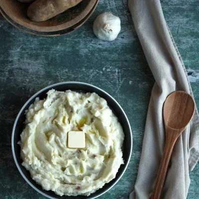 Mashed Potatoes from above against green background
