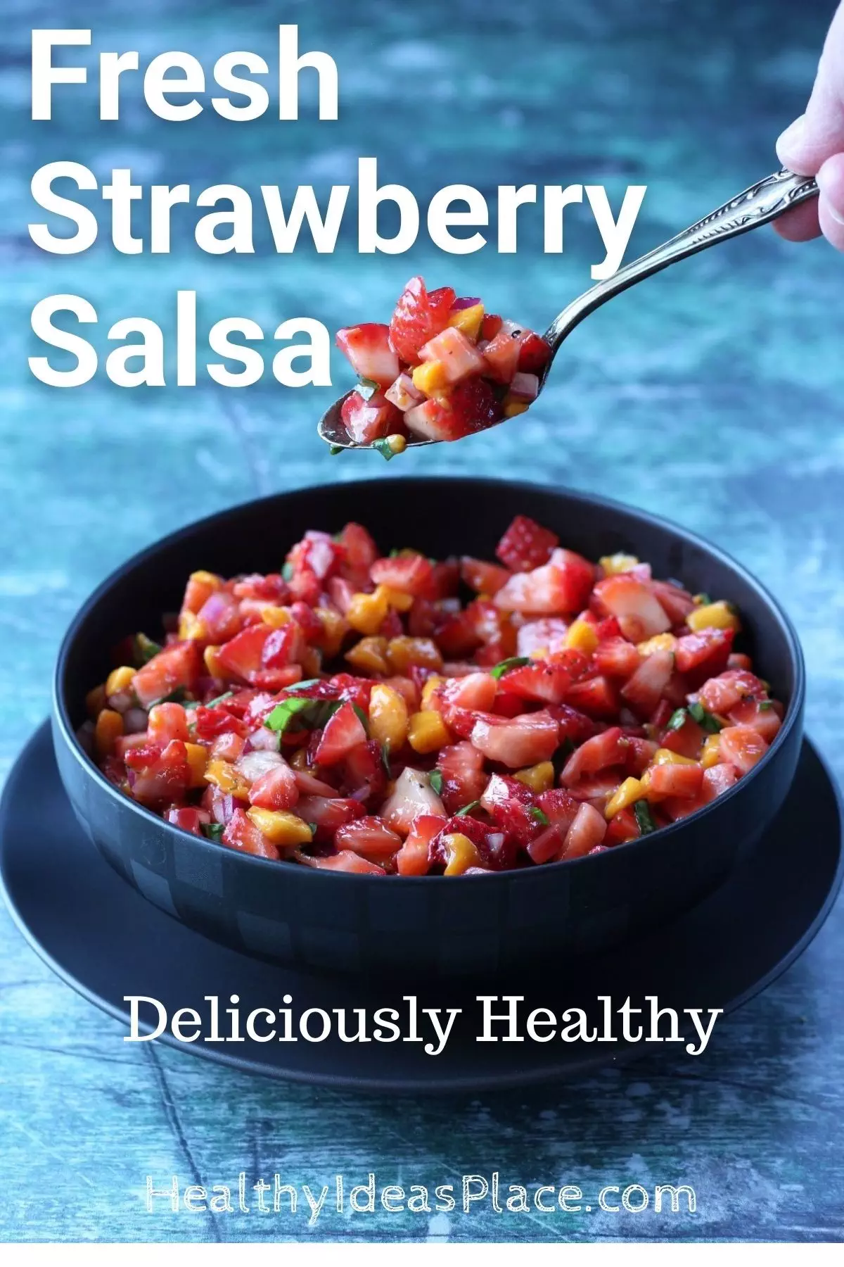 diced strawberries as a salsa in black bowl