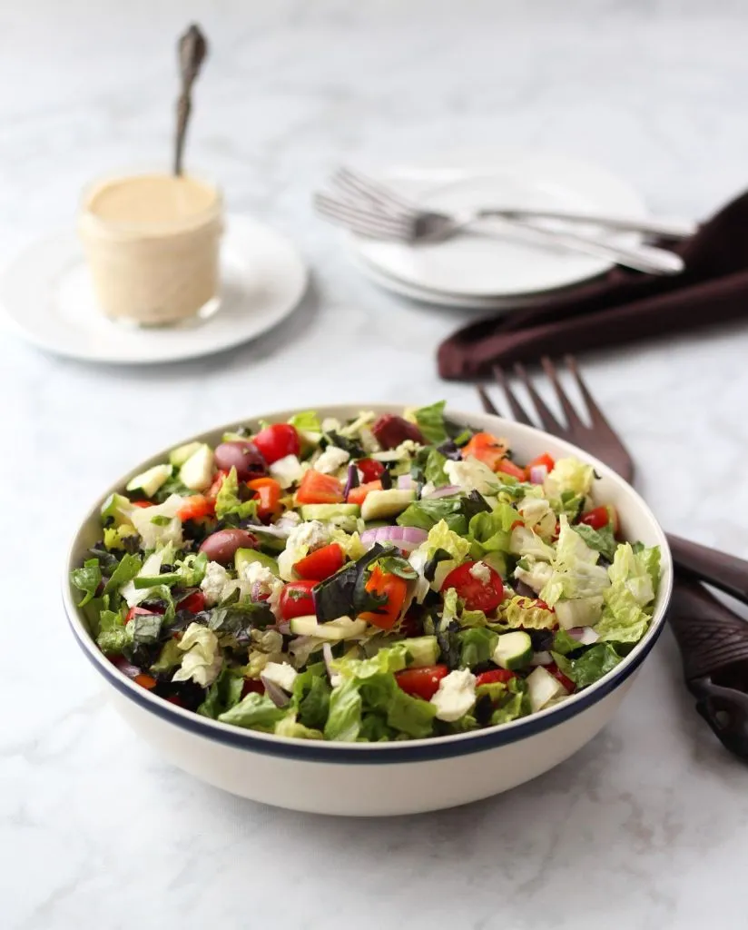 chopped salad in a white bowl