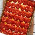roasted tomatoes on rimmed pan