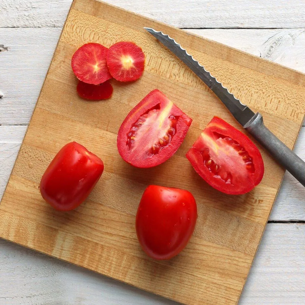 Tomatoes on cutting board