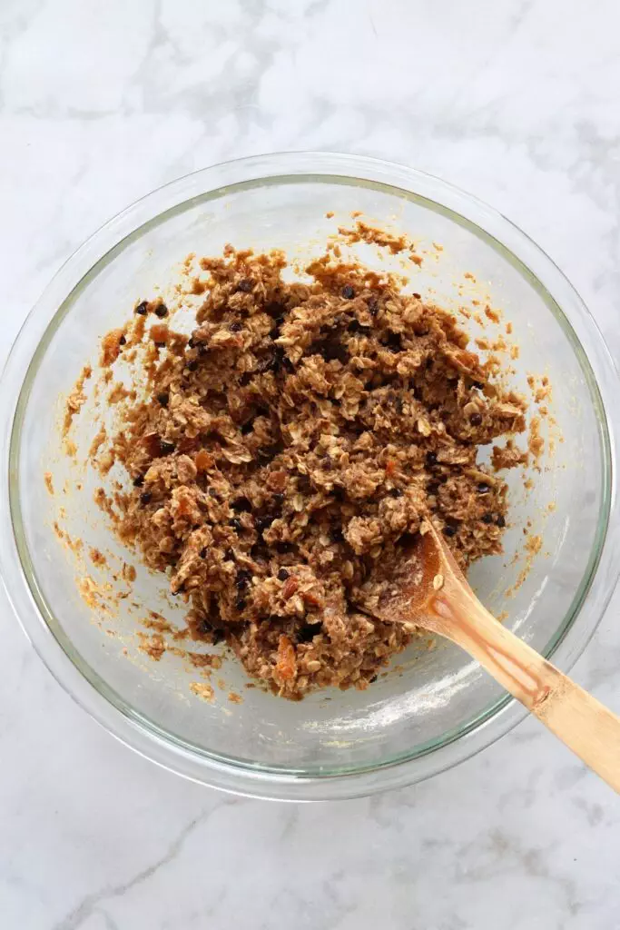 Raw breafkast cookie dough in clear bowl