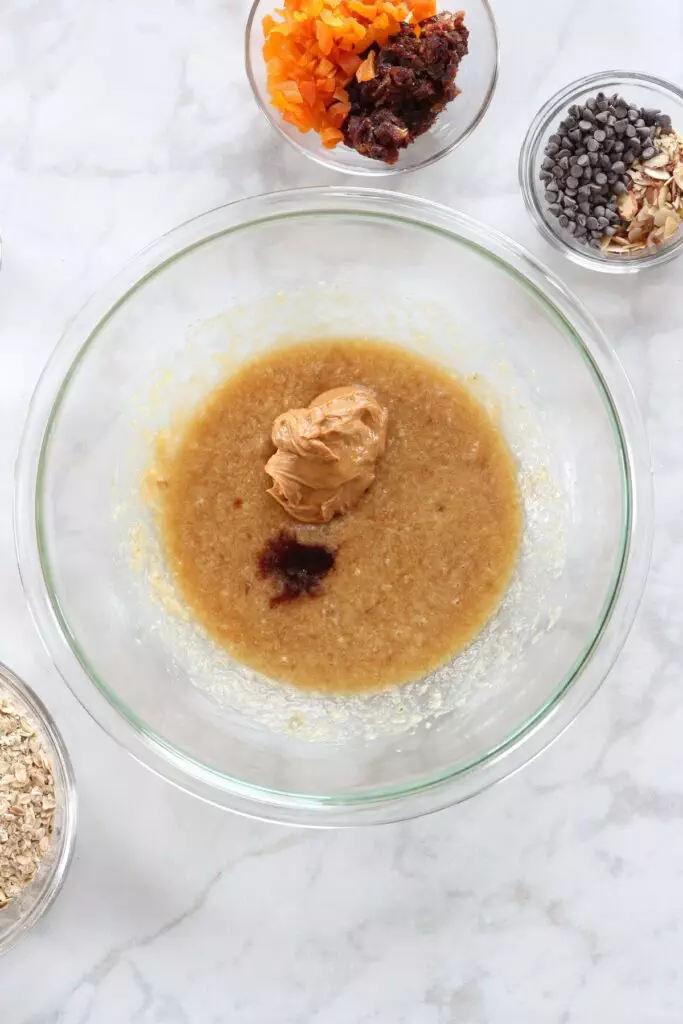 Wet ingredients for cookie dough in clear bowl