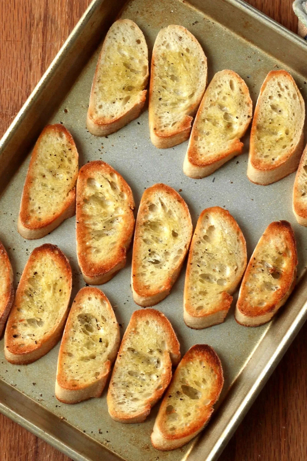 broiled crostini on pan